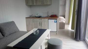 Фото номера Улучшенное шале Апартаменты Apartamenty i Domki PrzystańTu г. Ястарня 4