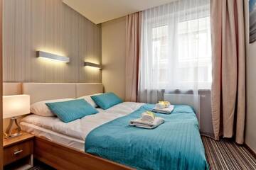 Фото номера One-Bedroom Apartment with Balcony - Floriana Ceynowy 13D/10 Street Апартаменты BlueApart Marina Jastarnia г. Ястарня 10